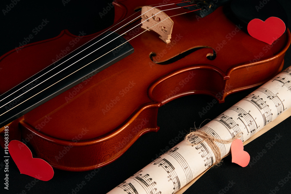 Fototapeta premium Violin, music notes and red hearts