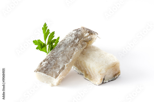 Salted dried cod isolated on white background. Typical Easter food

 photo