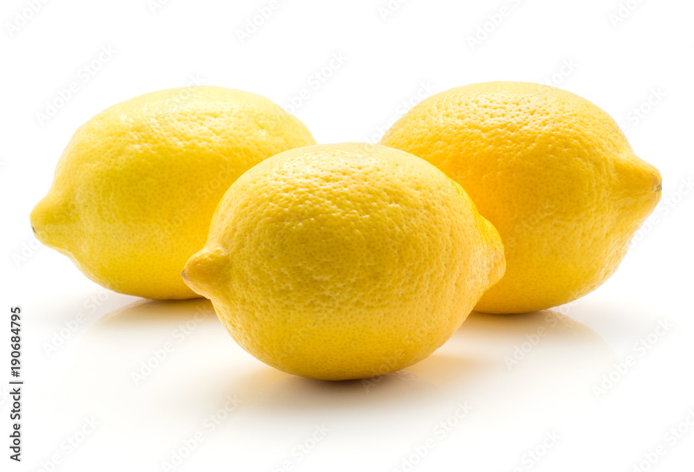 Three yellow lemons isolated on white background. Three yellow lemons isolated on white background.