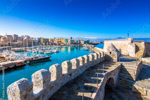 Heraklion harbour with old venetian fort Koule and shipyards, Crete, Greece