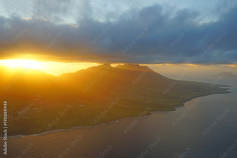 Fototapeta premium Aerial view of Mount Liamuiga on the volcanic Caribbean island of St Kitts at sunset