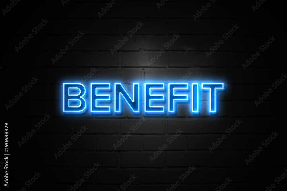 Fototapeta premium Benefit neon Sign on brickwall
