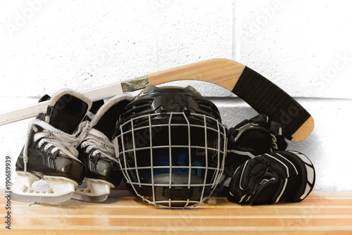 Kid's hockey gear: helmet, stick, gloves, skates