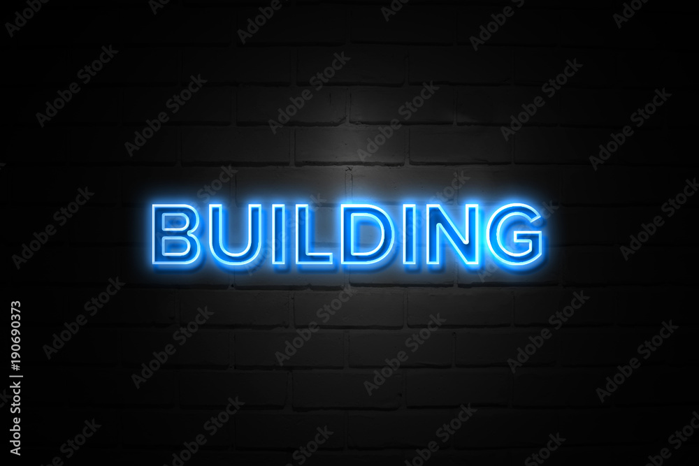 Building neon Sign on brickwall Building neon Sign on brickwall