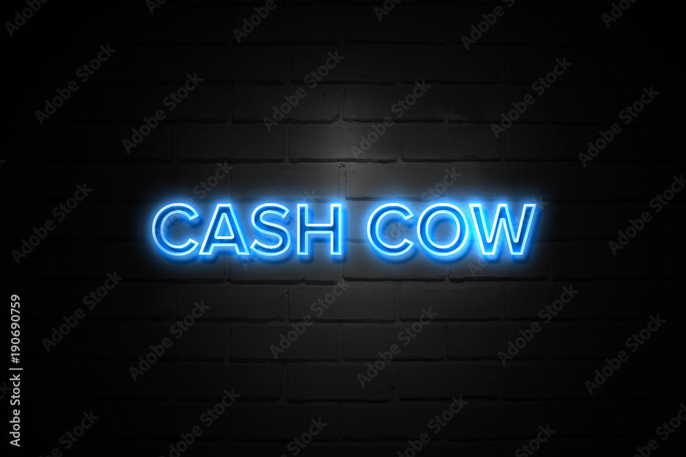 Cash Cow neon Sign on brickwall