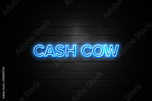 Foto Cash Cow neon Sign on brickwall