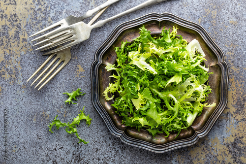Frize lettuce salad  fresh frisee. Healthy vegetarian food