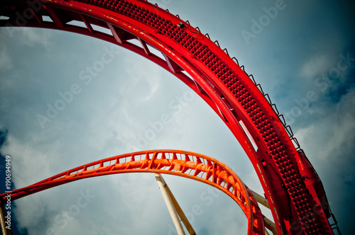 Fototapeta Naklejka Na Ścianę i Meble -  part of a red rolleroster in front of blue sky