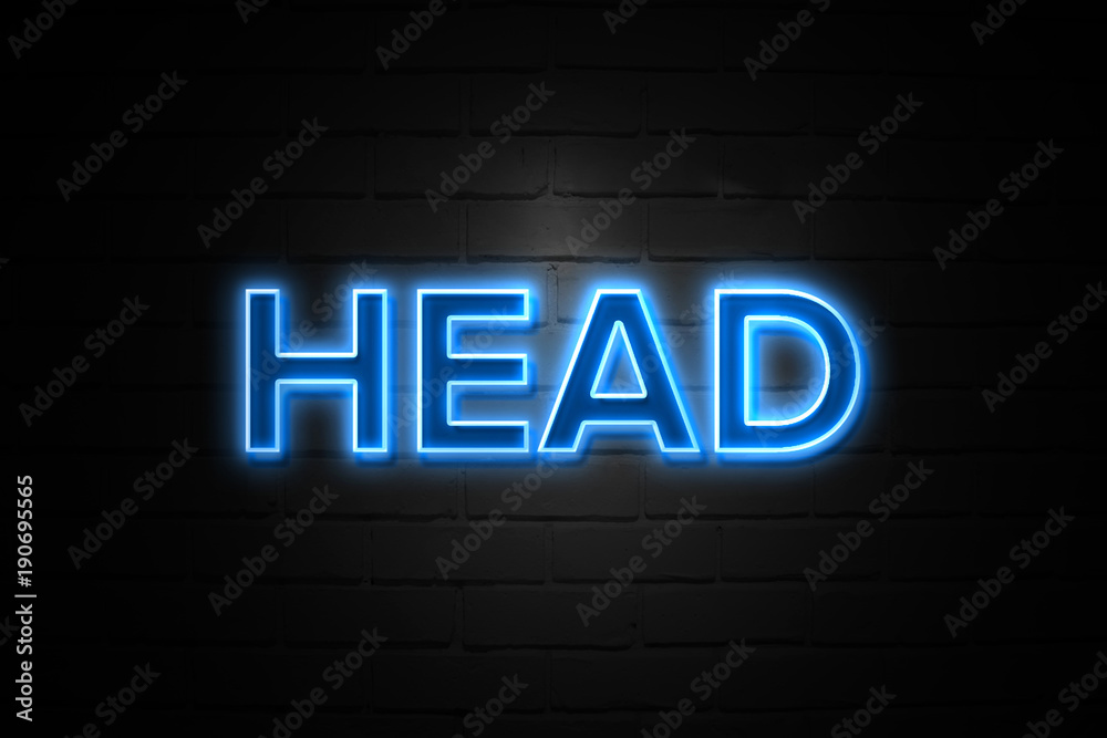 Head neon Sign on brickwall Head neon Sign on brickwall