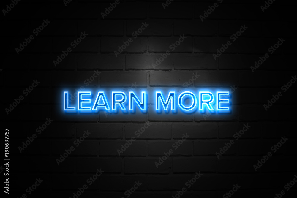 Learn More neon Sign on brickwall Learn More neon Sign on brickwall