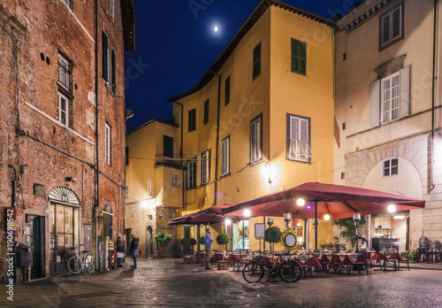 Cafe in Piazza degli Scalpellini at night, Lucca, Italy © Alexandre Rotenberg