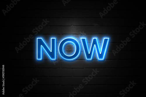 Now neon Sign on brickwall photo