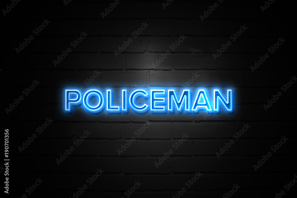 Policeman neon Sign on brickwall Policeman neon Sign on brickwall