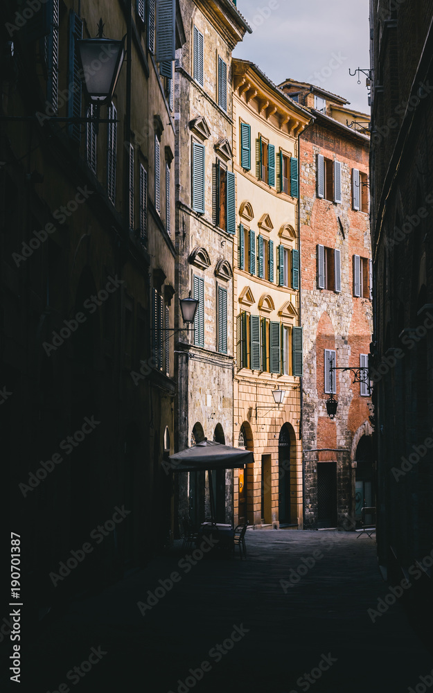 Small street in Siena, Tuscany, Italy