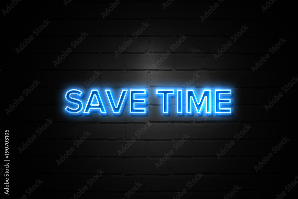 Save Time neon Sign on brickwall Save Time neon Sign on brickwall