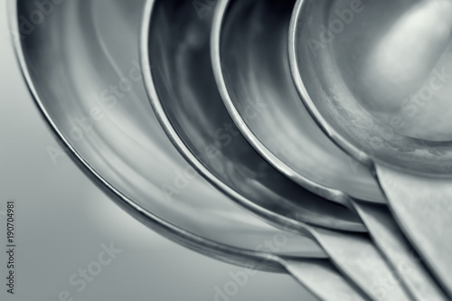 A Set of Measuring Spoons Inside Each Other As Concentric Circles