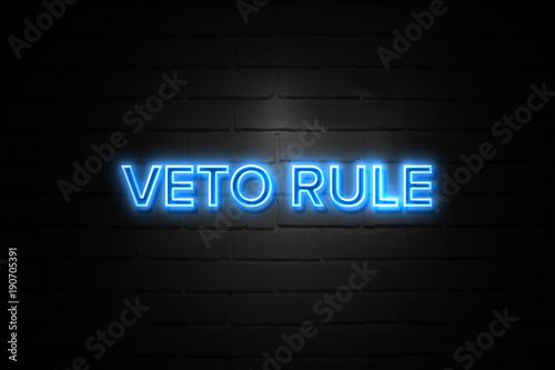 Veto Rule neon Sign on brickwall