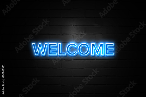 Welcome neon Sign on brickwall