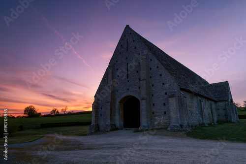 The Tithe Barn at Great Coxwell at sunset