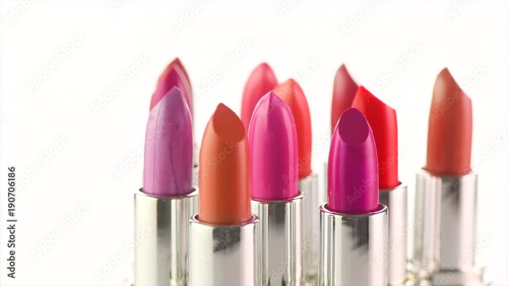 Lipstick tints palette. Fashion colorful lipsticks rotated over white background. Professional makeup and beauty. 4K UHD video footage. 3840X2160 Lipstick tints palette. Fashion colorful lipsticks rotated over white background. Professional makeup and beauty. 4K UHD video footage. 3840X2160