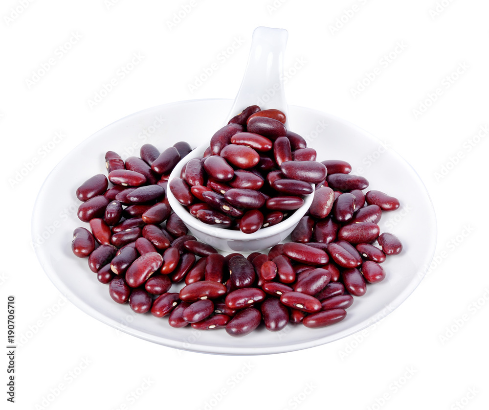 red beans in white spoons isolated on white background red beans in white spoons isolated on white background