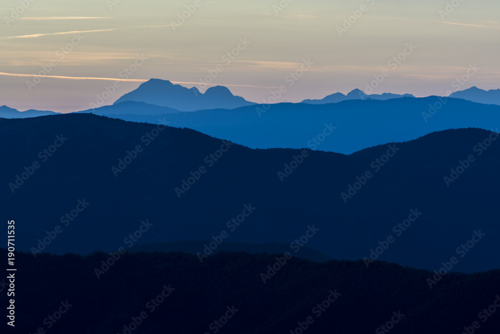 layers of mountains at blue hour layers of mountains at blue hour