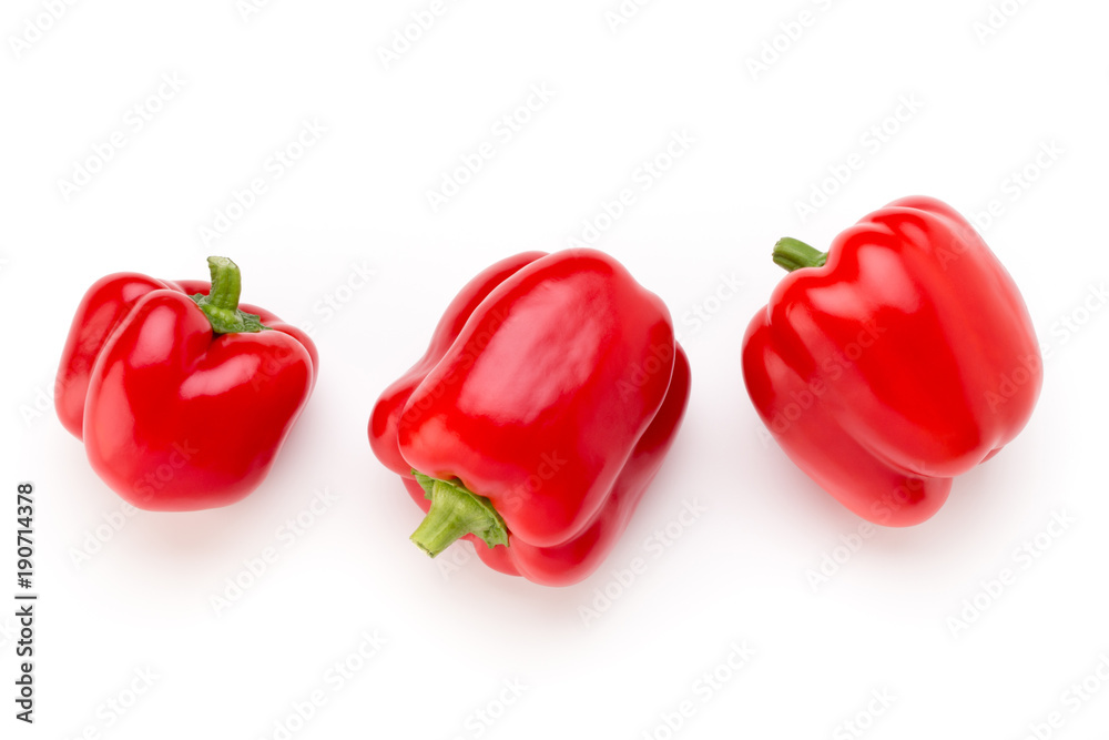 Red bell pepper with half and leaves isolated on white. Red bell pepper with half and leaves isolated on white.