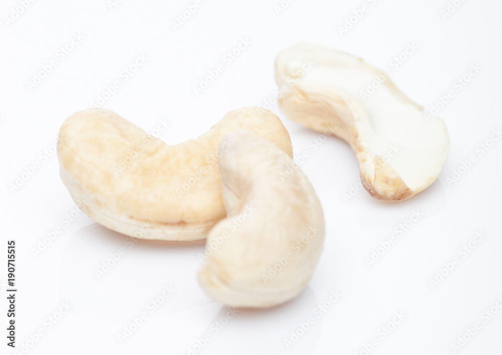 Healthy organic ceshew nuts macro on white Healthy organic ceshew nuts macro on white