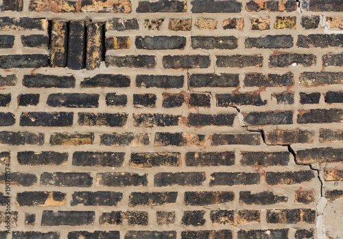 Black Brick Wall with Crack