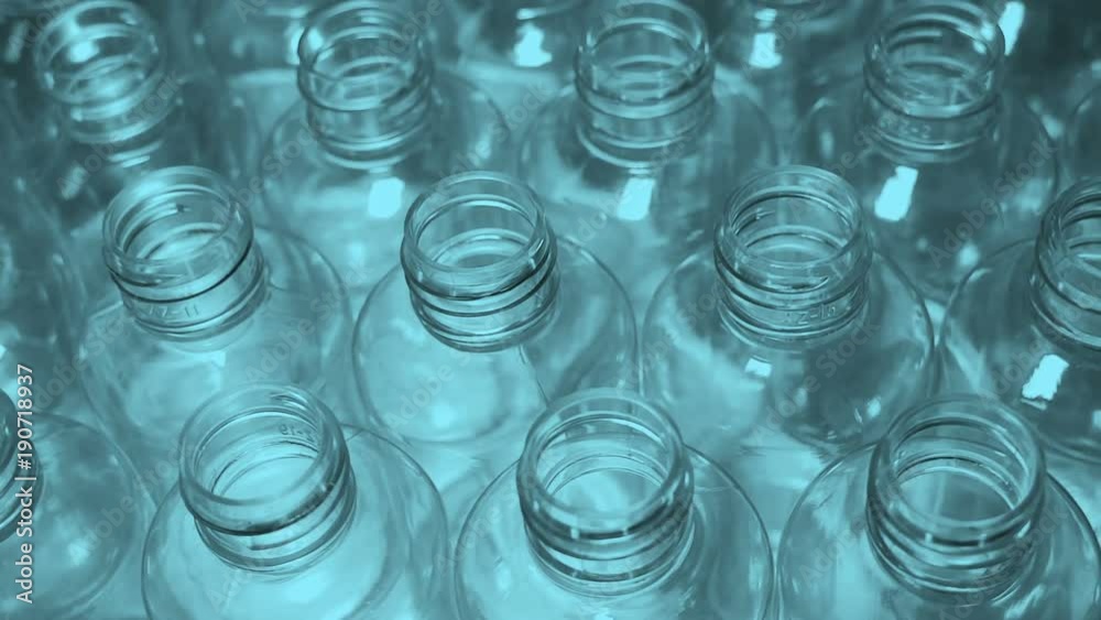 Manufacture of plastic bottles for the cosmetic and food industries. Garbage processing, secondary use. Earth pollution. Smooth rotation.