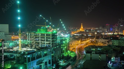 Doha construction building work workers skycreapers timelapse video crane moving Qatar, Middle East photo