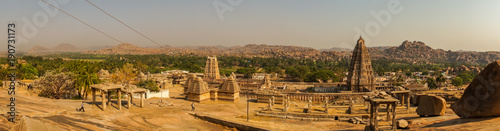 Panoramic scenic view on Virupaksha hindu temple and ruins, Hampi, India.