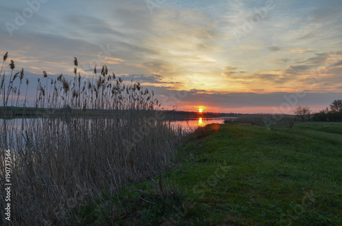 sunrise on green banks of Mechetka river in spring stanitsa Mechetinskaya  Rostov region  Russia