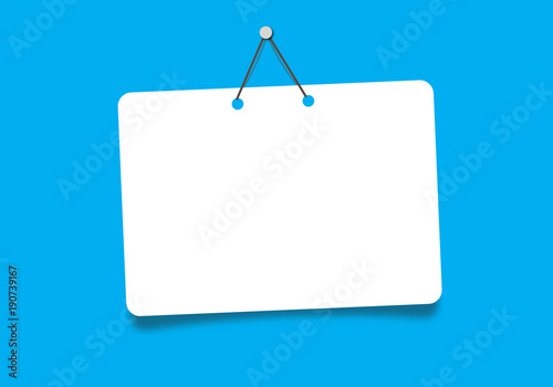 white sign hanging on blue  background photo