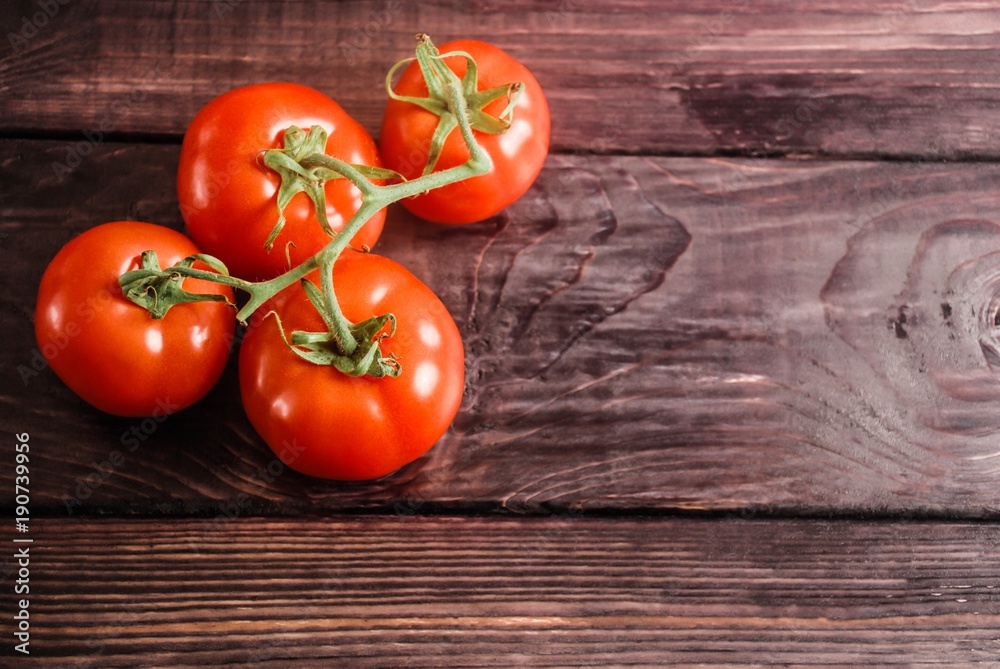 Tomatoes on wood Tomatoes on wood