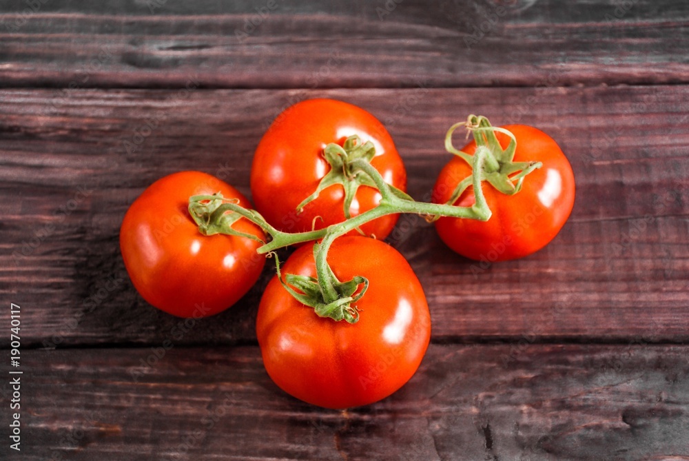 Tomatoes on wood Tomatoes on wood