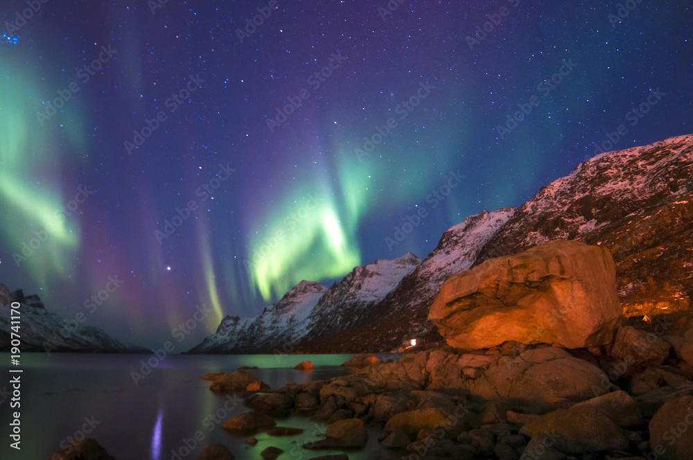 The polar lights in Norway . Ersfjord. Tromso