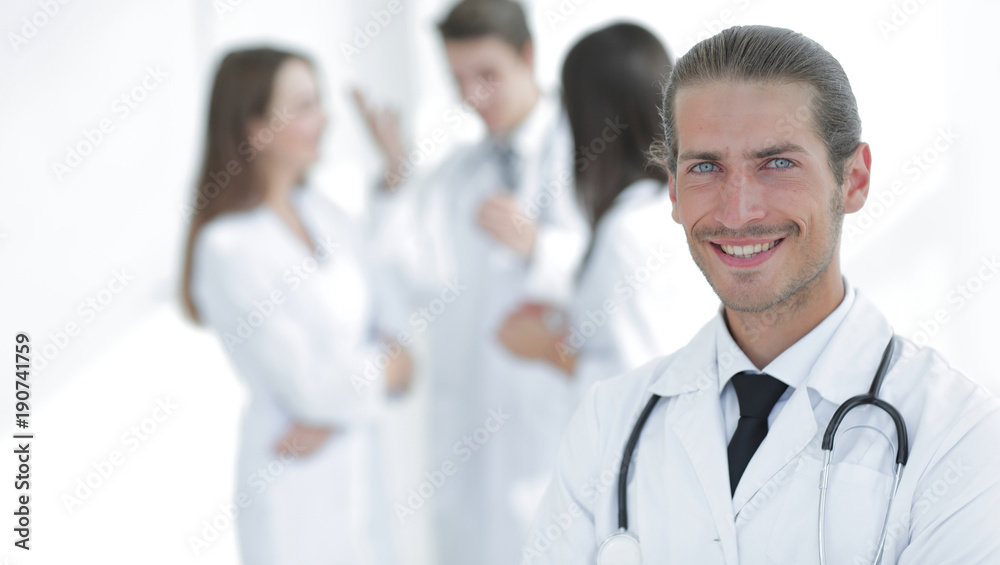 smiling doctor therapist on blurred background. smiling doctor therapist on blurred background.