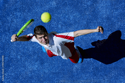 Aerial view of a young man playing paddle