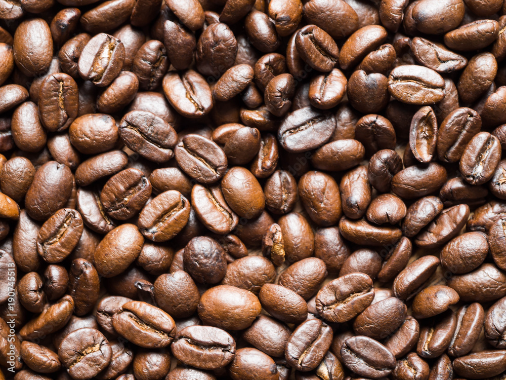 Black and brown cofee seed full frame for background Black and brown cofee seed full frame for background