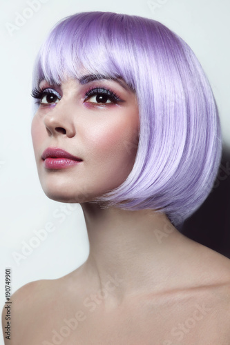 Young beautiful sexy girl with violet hair and fancy make-up