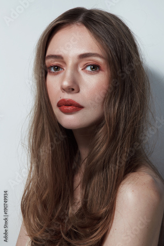 Young beautiful slim woman with messy hair and vintage style make-up