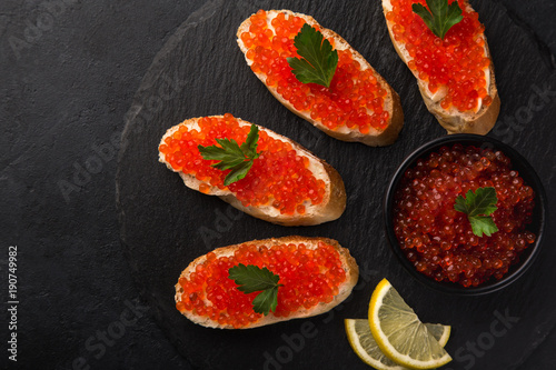 toasts with red caviar,