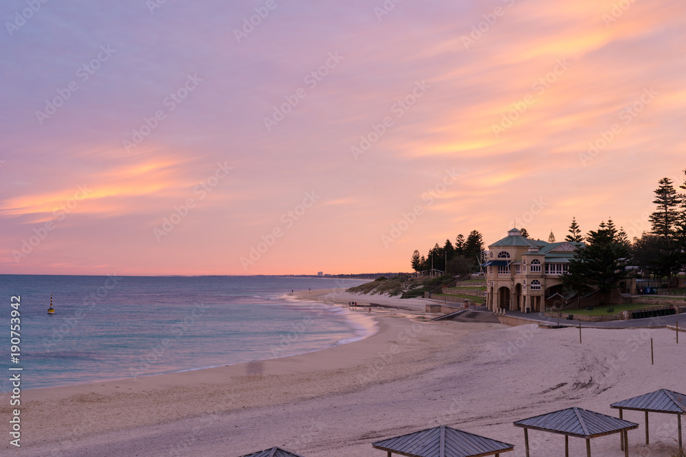Stunning pick and purple sunrise over Cottesloe Beach Western Australia
