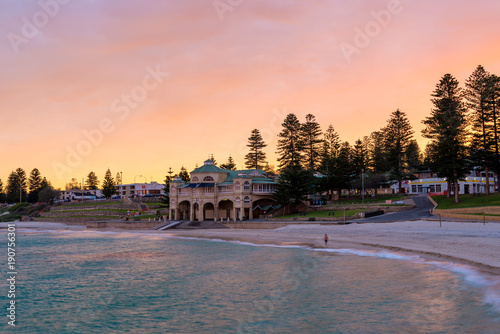 Stunning pick and purple sunrise over Cottesloe Beach Western Australia photo