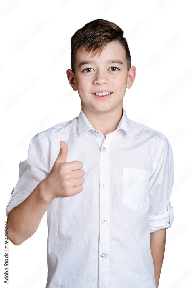 Portrait of happy teenager in white shirt showing thumbs up gesture isolated on white background Portrait of happy teenager in white shirt showing thumbs up gesture isolated on white background