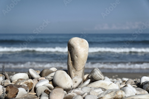Stones and pebbles on the beach on the Greek island of Corfu.