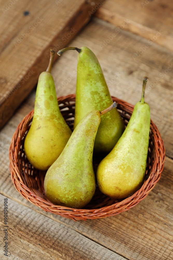 Fresh ripe green pears on the table Fresh ripe green pears on the table