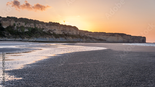 Sunset on Omaha Beach low tide Normandy France photo