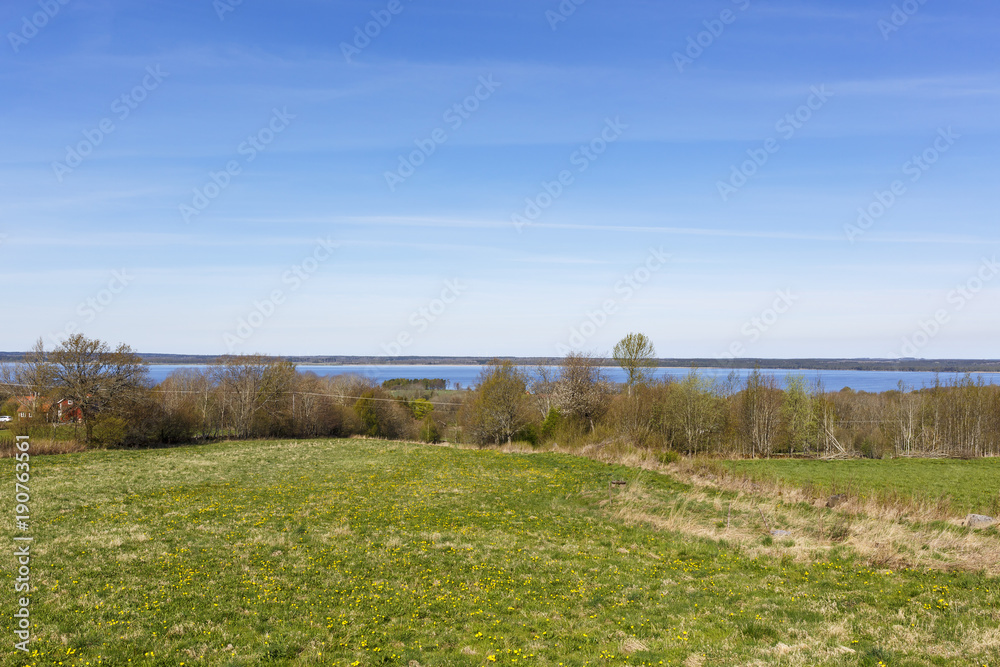 Landscape view with a lake in spring Landscape view with a lake in spring